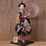 Figurine geisha parapluie